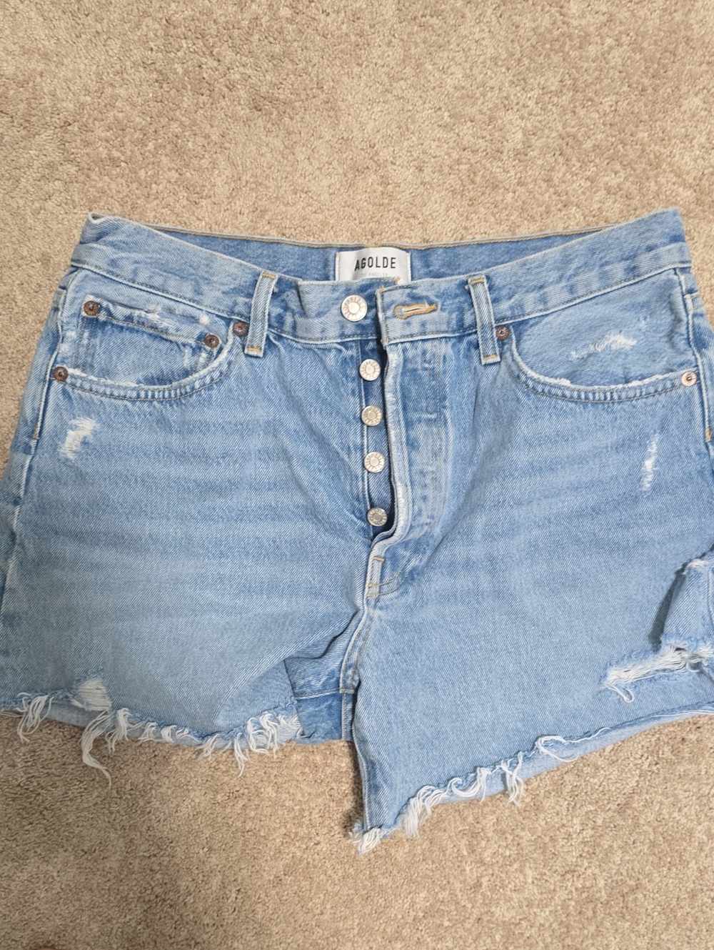 Agolde Faded Light Blue Distressed Denim Button-Fly Shorts